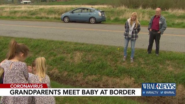 Grandparents in Canada meet baby at border
