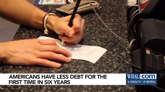 Americans have less debt for first time in 5 years 