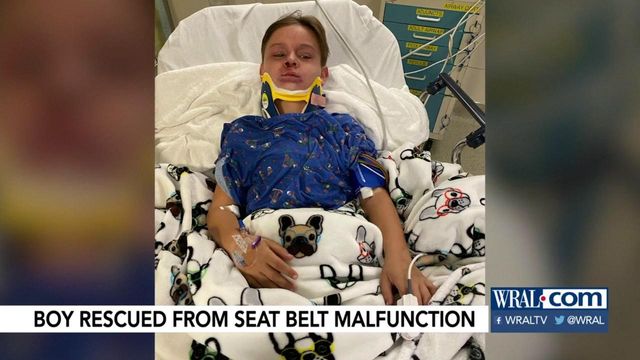 Boy rescued from seat belt malfunction