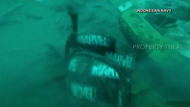 Indonesian Navy divers searching for black boxes from downed flight 