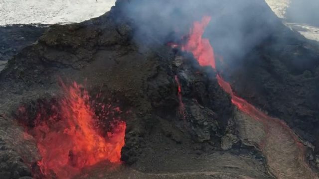 Drone video shows lava flow of erupting volcano in Iceland 