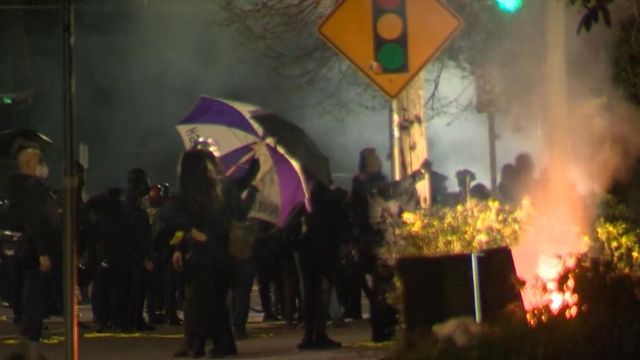 Riot declared in Portland after protestors break windows, throw projectiles at police 