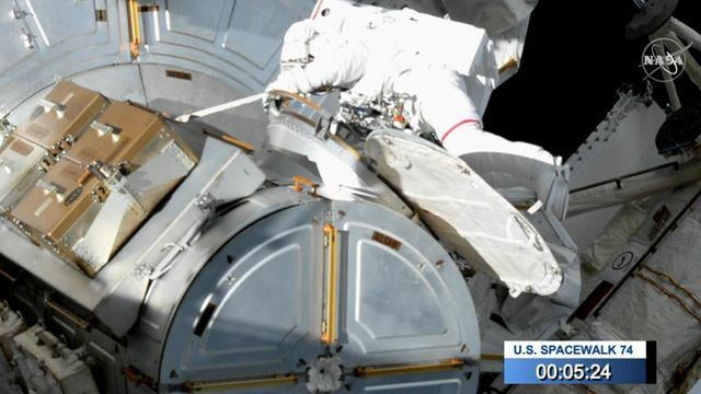 NASA astronauts perform space walk outside International Space Station 