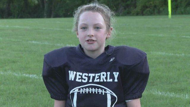 10-year-old girl turning heads as Pee Wee team's starting quarterback