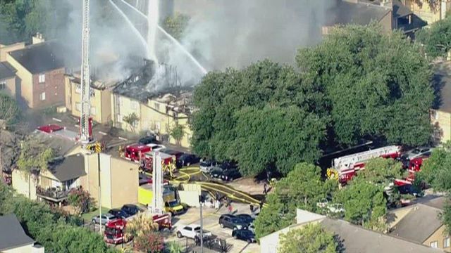 Firefighters fight 2-alarm fire at Houston apartment building