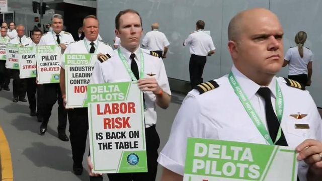 Delta pilots picket amid travel chaos 