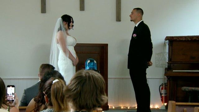 Couple has AI officiate their wedding