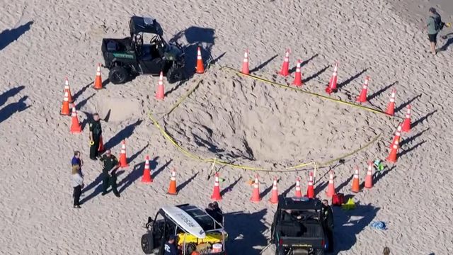 Girl dies after digging hole at Florida beach