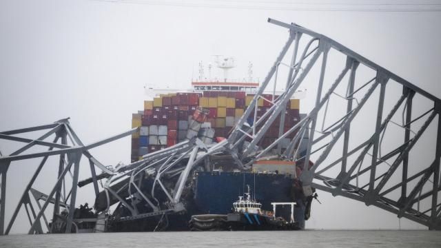The Dali container ship and collapsed Francis Scott Key Bridge in Baltimore, Md., on Wednesday, March 27, 2024. Investigators were piecing together on Wednesday what had caused the massive cargo ship to lose propulsion as it left Baltimore and strike the major bridge, making it collapse. (Pete Kiehart/The New York Times)