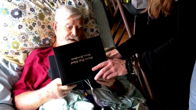 Marine vet in hospice care receives high school diploma