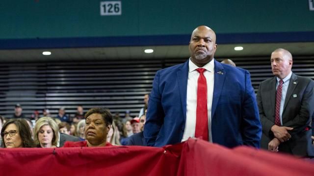 FILE — Lt. Gov. Mark Robinson, the controversial Republican candidate for governor of North Carolina, and wife, Yolanda Hill, at his right, as former President Donald Trump speaks at a campaign rally in Greensboro, N.C., on March 2, 2024. Balanced Nutrition, a business started by Hill shut down in April after state regulators began looking into its operations. (Veasey Conway/The New York Times)