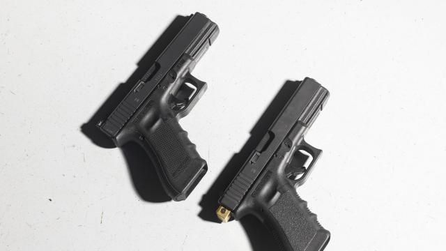 FILE — Glock handguns, one with a switch attached, in Edina, Minn., July 13, 2023. Minnesota and New Jersey sued Glock on Thursday, Dec. 12, 2024, over the design of its iconic 9-millimeter semiautomatic pistol, claiming that the company had failed to make changes to prevent its easy conversion to a deadly, illegal machine gun. (Jenn Ackerman/The New York Times)