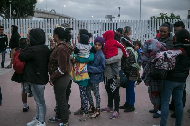U.S. Allows Some Members of Migrant Caravan to Apply for Asylum