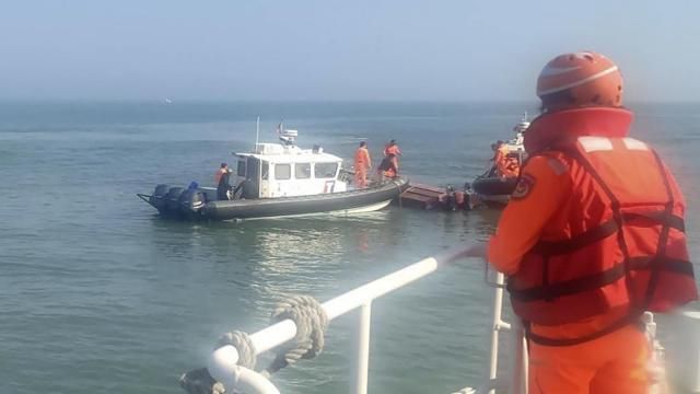 In this handout photograph provided by Taiwan Coast Guard Administration, Taiwanese coast guards inspect a vessel that capsized during a chase off the coast of Kinmen archipelago in Taiwan, Wednesday, Feb. 14, 2024. The unnamed vessel had been sailing about one nautical mile off the coast of an islet of Kinmen island and was trespassing, said Taiwan’s Coast Guard Administration. Four fishermen fell into the water and two survived and are in “good shape,” while resuscitation efforts on the other two failed, the vice director of the Coast Guard in Kinmen, Chen Jien-wen, told a local TV channel. (Taiwan Coast Guard Administration via AP) In this handout photograph provided by Taiwan Coast Guard Administration, Taiwanese coast guards inspect a vessel that capsized during a chase off the coast of Kinmen archipelago in Taiwan, Wednesday, Feb. 14, 2024. The unnamed vessel had been sailing about one nautical mile off the coast of an islet of Kinmen island and was trespassing, said Taiwan’s Coast Guard Administration. Four fishermen fell into the water and two survived and are in “good shape,” while resuscitation efforts on the other two failed, the vice director of the Coast Guard in Kinmen, Chen Jien-wen, told a local TV channel. (Taiwan Coast Guard Administration via AP)