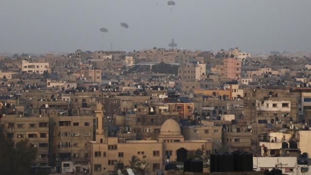 Humanitarian aid is dropped by the United States over Gaza City, Gaza Strip, on Saturday, March 2, 2024. (AP Photo/Mohammed Hajjar) Humanitarian aid is dropped by the United States over Gaza City, Gaza Strip, on Saturday, March 2, 2024. (AP Photo/Mohammed Hajjar)