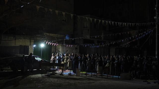 Muslim worshippers perform "tarawih," an extra lengthy prayer held during the Muslim holy month of Ramadan, in Rafah, Gaza Strip, Sunday, March 10, 2024. Officials in Saudi Arabia have declared the start of the fasting month of Ramadan after sighting the crescent moon Sunday night. The announcement marks the beginning of Ramadan for many of the world's 1.8 billion Muslims. (AP Photo/Fatima Shbair) Muslim worshippers perform "tarawih," an extra lengthy prayer held during the Muslim holy month of Ramadan, in Rafah, Gaza Strip, Sunday, March 10, 2024. Officials in Saudi Arabia have declared the start of the fasting month of Ramadan after sighting the crescent moon Sunday night. The announcement marks the beginning of Ramadan for many of the world's 1.8 billion Muslims. (AP Photo/Fatima Shbair)