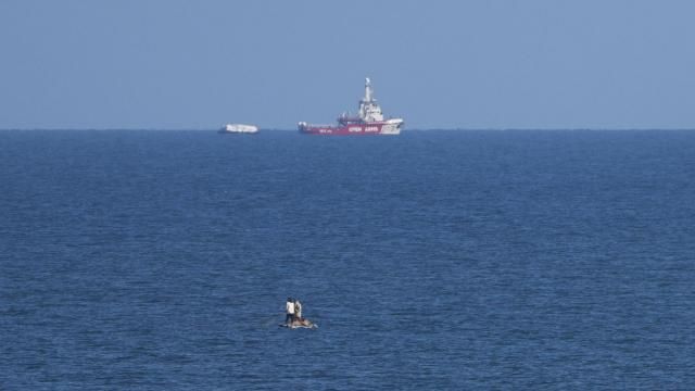 A ship belonging to the Open Arms aid group approaches the shores of Gaza towing a barge with 200 tons of humanitarian aid on Friday, March 15, 2024. The ship set sail Tuesday from Cyprus to inaugurate a sea route to get desperately needed aid into the war-wracked enclave, which is suffering a humanitarian crisis five months into the Israel-Hamas war. (AP Photo/Abdel Kareem Hana) A ship belonging to the Open Arms aid group approaches the shores of Gaza towing a barge with 200 tons of humanitarian aid on Friday, March 15, 2024. The ship set sail Tuesday from Cyprus to inaugurate a sea route to get desperately needed aid into the war-wracked enclave, which is suffering a humanitarian crisis five months into the Israel-Hamas war. (AP Photo/Abdel Kareem Hana)