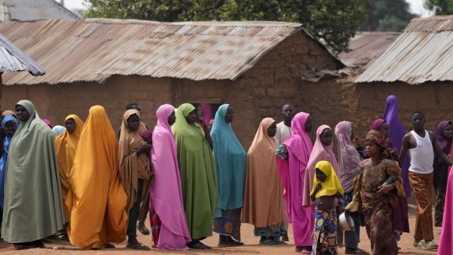 FILE - Parents wait for news about the kidnapped LEA Primary and Secondary School Kuriga students in Kuriga, Kaduna, Nigeria, on March 9, 2024. Nearly 300 schoolchildren abducted from their school in northwest Nigeria’s Kaduna state have been released, the state governor said Sunday, March 24, more than two weeks after the children were seized from their school. (AP Photo/Sunday Alamba, File) FILE - Parents wait for news about the kidnapped LEA Primary and Secondary School Kuriga students in Kuriga, Kaduna, Nigeria, on March 9, 2024. Nearly 300 schoolchildren abducted from their school in northwest Nigeria’s Kaduna state have been released, the state governor said Sunday, March 24, more than two weeks after the children were seized from their school. (AP Photo/Sunday Alamba, File)