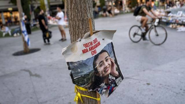 A poster depicting Israeli hostage Noa Argamani, 26, is displayed next to a memorial in Tel Aviv on Thursday, April 4, 2024. Argamani was kidnapped to Gaza on Oct. 7 during the cross-border attack by Hamas militants at the Nova music festival near Kibbutz Re’im, southern Israel. Half a year into Israel's war, agonized families are in a race against time. In November, a weeklong cease-fire deal saw the release of more than 100 hostages. But the war is dragging on, with no end in sight and no serious hostage deal on the table. (AP Photo/Oded Balilty) A poster depicting Israeli hostage Noa Argamani, 26, is displayed next to a memorial in Tel Aviv on Thursday, April 4, 2024. Argamani was kidnapped to Gaza on Oct. 7 during the cross-border attack by Hamas militants at the Nova music festival near Kibbutz Re’im, southern Israel. Half a year into Israel's war, agonized families are in a race against time. In November, a weeklong cease-fire deal saw the release of more than 100 hostages. But the war is dragging on, with no end in sight and no serious hostage deal on the table. (AP Photo/Oded Balilty)