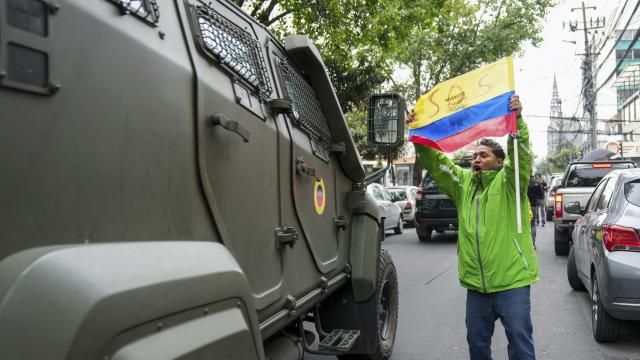 A supporter of former Ecuadorian Vice President Jorge Glas protests as a military vehicle transports him from the detention center he was held following his arrest at the Mexican Embassy in Quito Ecuador, Saturday, April 6, 2024. Glas, who held the vice presidency of Ecuador between 2013 and 2018, was convicted of corruption and had been taking refuge in the embassy since December. (AP Photo/Dolores Ochoa) A supporter of former Ecuadorian Vice President Jorge Glas protests as a military vehicle transports him from the detention center he was held following his arrest at the Mexican Embassy in Quito Ecuador, Saturday, April 6, 2024. Glas, who held the vice presidency of Ecuador between 2013 and 2018, was convicted of corruption and had been taking refuge in the embassy since December. (AP Photo/Dolores Ochoa)