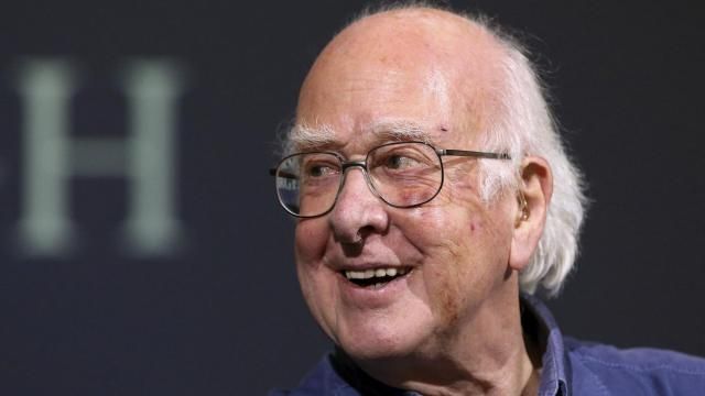 FILE - Britain's Professor Peter Higgs smiles during a press conference in Edinburgh, Scotland, on Oct. 11, 2013. The University of Edinburgh says Nobel prize-winning physicist Peter Higgs, who proposed the existence of the Higgs boson particle, has died at 94. Higgs predicted the existence of a new particle — the so-called Higgs boson — in 1964. But it would be almost 50 years before the particle’s existence could be confirmed at the Large Hadron Collider. Higgs won the 2013 Nobel Prize in Physics for his work, alongside Francois Englert of Belgium. (AP Photo/Scott Heppell, File) FILE - Britain's Professor Peter Higgs smiles during a press conference in Edinburgh, Scotland, on Oct. 11, 2013. The University of Edinburgh says Nobel prize-winning physicist Peter Higgs, who proposed the existence of the Higgs boson particle, has died at 94. Higgs predicted the existence of a new particle — the so-called Higgs boson — in 1964. But it would be almost 50 years before the particle’s existence could be confirmed at the Large Hadron Collider. Higgs won the 2013 Nobel Prize in Physics for his work, alongside Francois Englert of Belgium. (AP Photo/Scott Heppell, File)