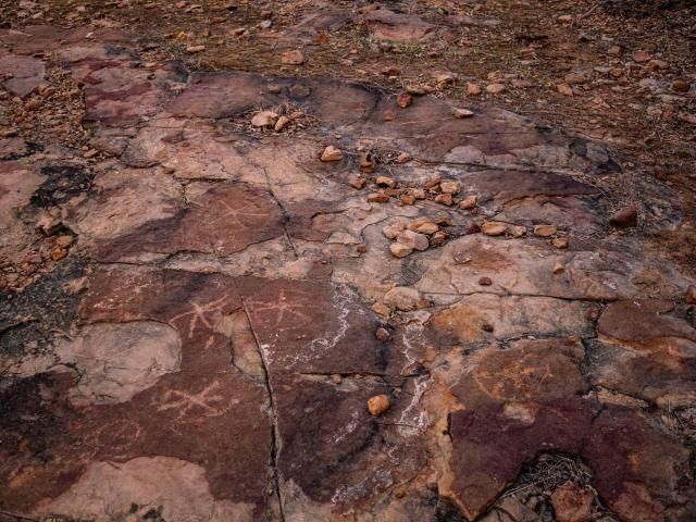 Mysterious symbols found near footprints shed light on ancient humans ...