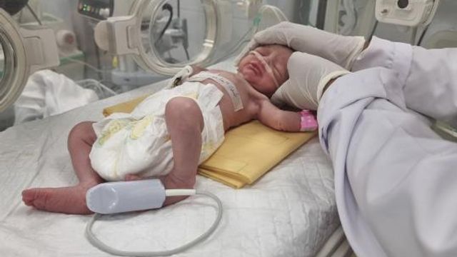 A Palestinian baby girl, Sabreen Jouda, who was delivered prematurely after her mother was killed in an Israeli strike along with her husband and daughter, lies in an incubator in the Emirati hospital in Rafah, southern Gaza Strip. Sunday, April 21, 2024. (AP Photo/Mohammad Jahjouh) A Palestinian baby girl, Sabreen Jouda, who was delivered prematurely after her mother was killed in an Israeli strike along with her husband and daughter, lies in an incubator in the Emirati hospital in Rafah, southern Gaza Strip. Sunday, April 21, 2024. (AP Photo/Mohammad Jahjouh)