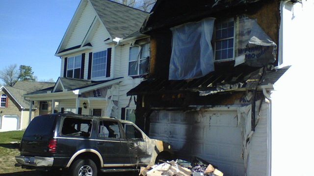 Family Unhurt After SUV Fire Spreads to Home