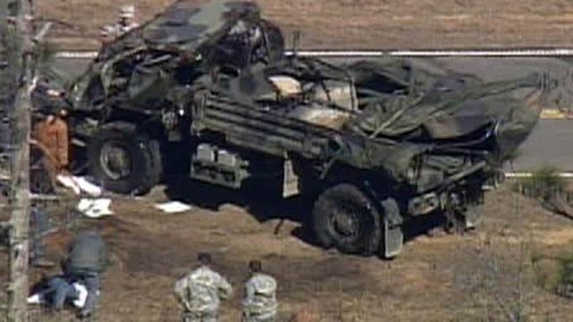 Sky 5 video of overturned Army truck