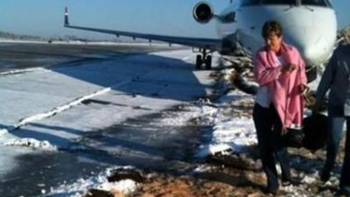Plane hits ice, slides from Charlotte runway