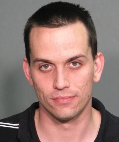 Man charged with groping woman in bathroom stall