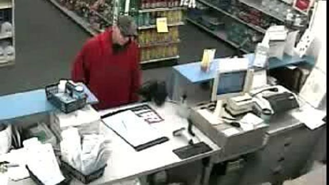 Security video shows pharmacy robbery