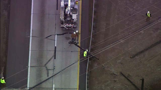 Downed power lines close Durham Freeway for hours
