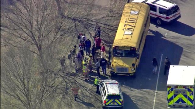 Three injured in school bus hit-and-run