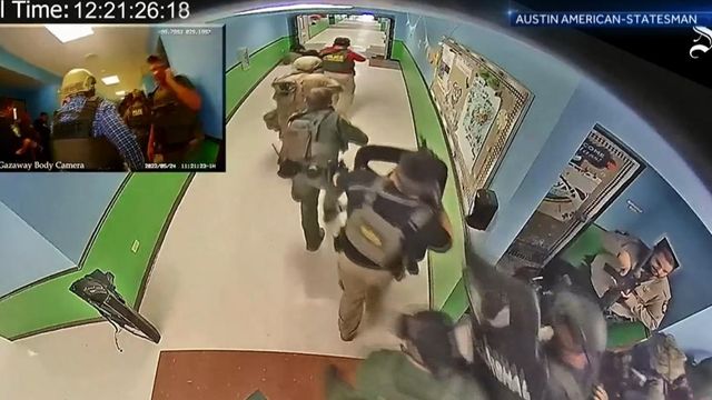 Surveillance video shows gunman entering Texas elementary school, police response 