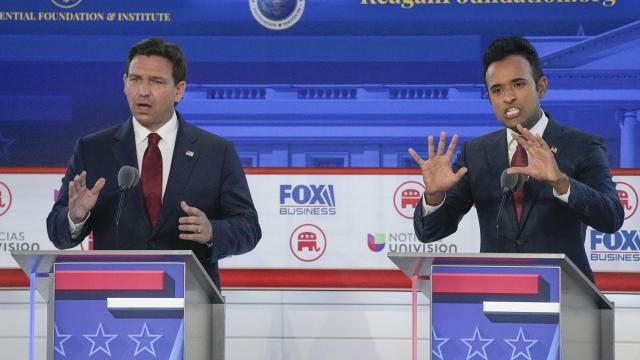 Republican presidential candidates, Florida Gov. Ron DeSantis, left, and entrepreneur Vivek Ramaswamy, right, both speaking during a Republican presidential primary debate hosted by FOX Business Network and Univision, Wednesday, Sept. 27, 2023, at the Ronald Reagan Presidential Library in Simi Valley, Calif. (AP Photo/Mark Terrill)