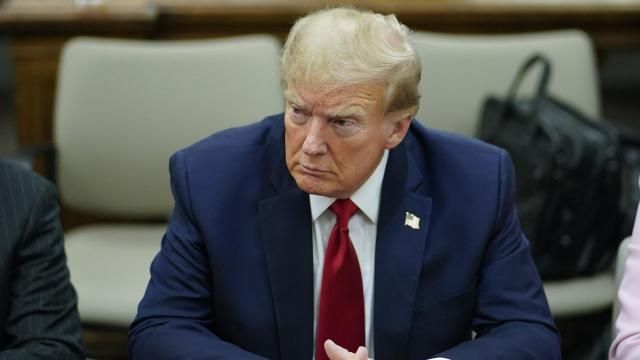 FILE - Former President Donald Trump, center, sits at the defense table with his attorney's Christopher Kise, left, and Alina Habba, at New York Supreme Court, Thursday, Dec. 7, 2023, in New York. (AP Photo/Eduardo Munoz Alvarez, Pool, File)