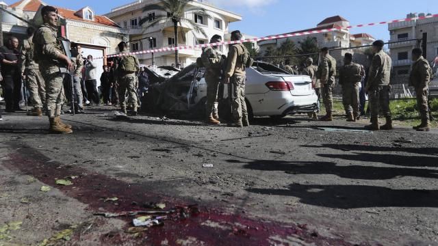 Lebanese army soldiers gather around a damaged car near the coastal town of Jadra, south Lebanon, Saturday, Feb. 10, 2024. An apparent Israeli drone strike hit a car near Lebanon's southern port city of Sidon Saturday killing at least two people and wounded others, security officials said. (AP Photo/Mohammed Zaatari) Lebanese army soldiers gather around a damaged car near the coastal town of Jadra, south Lebanon, Saturday, Feb. 10, 2024. An apparent Israeli drone strike hit a car near Lebanon's southern port city of Sidon Saturday killing at least two people and wounded others, security officials said. (AP Photo/Mohammed Zaatari)