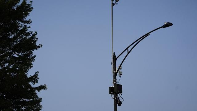 FILE - ShotSpotter equipment overlooks the intersection of South Stony Island Avenue and East 63rd Street in Chicago on Aug. 10, 2021. Chicago won't renew its contract for the controversial gunshot detection system and end the use of ShotSpotter technology later this year, Mayor Brandon Johnson’s office announced Tuesday, Feb. 13, 2024. (AP Photo/Charles Rex Arbogast, file) FILE - ShotSpotter equipment overlooks the intersection of South Stony Island Avenue and East 63rd Street in Chicago on Aug. 10, 2021. Chicago won't renew its contract for the controversial gunshot detection system and end the use of ShotSpotter technology later this year, Mayor Brandon Johnson’s office announced Tuesday, Feb. 13, 2024. (AP Photo/Charles Rex Arbogast, file)