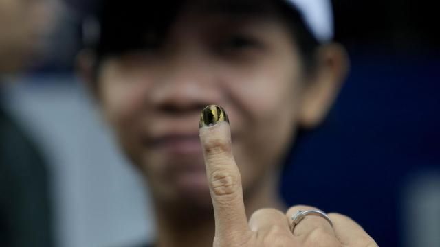 A woman shows her finger inked to mark that she has already voted during the election in Jakarta, Indonesia, Wednesday, Feb. 14, 2024. Millions of Indonesians were choosing a new president Wednesday as the world's third-largest democracy aspires to become a global economic powerhouse just over 25 years since emerging from a brutal authoritarian era. (AP Photo/Dita Alangkara) A woman shows her finger inked to mark that she has already voted during the election in Jakarta, Indonesia, Wednesday, Feb. 14, 2024. Millions of Indonesians were choosing a new president Wednesday as the world's third-largest democracy aspires to become a global economic powerhouse just over 25 years since emerging from a brutal authoritarian era. (AP Photo/Dita Alangkara)