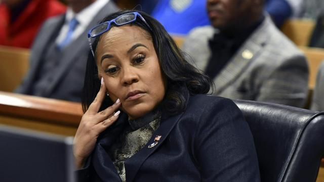 FILE - Fulton County District Attorney Fani Willis appears during a hearing regarding defendant Harrison Floyd, a leader in the organization Black Voices for Trump, as part of the Georgia election indictments, Nov. 21, 2023, in Atlanta. A Georgia judge who is deciding whether to toss Fulton County District Attorney Fani Willis off of her election interference case against former President Donald Trump has set a hearing for Thursday that is expected to focus on details of Willis' personal relationship with a special prosecutor she hired. (Dennis Byron/Hip Hop Enquirer via AP, File) FILE - Fulton County District Attorney Fani Willis appears during a hearing regarding defendant Harrison Floyd, a leader in the organization Black Voices for Trump, as part of the Georgia election indictments, Nov. 21, 2023, in Atlanta. A Georgia judge who is deciding whether to toss Fulton County District Attorney Fani Willis off of her election interference case against former President Donald Trump has set a hearing for Thursday that is expected to focus on details of Willis' personal relationship with a special prosecutor she hired. (Dennis Byron/Hip Hop Enquirer via AP, File)