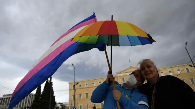 Supporters of same-sex marriage bill take part in a rally, at central Syntagma Square, in Athens, Greece, Thursday, Feb. 15, 2024. Greece's parliament is to vote Thursday to legalize same-sex civil marriage in a first for an Orthodox Christian country and despite opposition from the influential Greek Church. (AP Photo/Michael Varaklas) Supporters of same-sex marriage bill take part in a rally, at central Syntagma Square, in Athens, Greece, Thursday, Feb. 15, 2024. Greece's parliament is to vote Thursday to legalize same-sex civil marriage in a first for an Orthodox Christian country and despite opposition from the influential Greek Church. (AP Photo/Michael Varaklas)