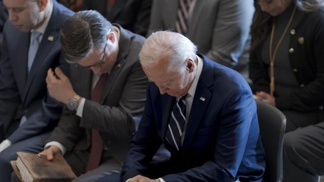 FILE- President Joe Biden, with from left, House Minority Leader Hakeem Jeffries, D-N.Y., and House Speaker Mike Johnson of La., pray and listen during the National Prayer Breakfast, Thursday, Feb. 1, 2024, at the Capitol in Washington. Johnson has spoken in the past of his belief America was founded as a Christian nation. Biden, while citing his own Catholic faith, has spoken of values shared by people of “any other faith, or no faith at all.” (AP Photo/J. Scott Applewhite, File) FILE- President Joe Biden, with from left, House Minority Leader Hakeem Jeffries, D-N.Y., and House Speaker Mike Johnson of La., pray and listen during the National Prayer Breakfast, Thursday, Feb. 1, 2024, at the Capitol in Washington. Johnson has spoken in the past of his belief America was founded as a Christian nation. Biden, while citing his own Catholic faith, has spoken of values shared by people of “any other faith, or no faith at all.” (AP Photo/J. Scott Applewhite, File)