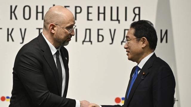 Ukraine's Prime Minister Denys Shmyhal shakes hands with Japanese Prime Minister Fumio Kishida during the Japan-Ukraine Conference for Promotion of Economic Growth and Reconstruction at Keidanren Kaikan building in Tokyo, Monday, Feb. 19, 2024. (Kazuhiro Nogi/Pool Photo via AP) Ukraine's Prime Minister Denys Shmyhal shakes hands with Japanese Prime Minister Fumio Kishida during the Japan-Ukraine Conference for Promotion of Economic Growth and Reconstruction at Keidanren Kaikan building in Tokyo, Monday, Feb. 19, 2024. (Kazuhiro Nogi/Pool Photo via AP)