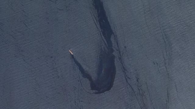 In this satellite image provided by Planet Labs, the Belize-flagged bulk carrier Rubymar is seen in the southern Red Sea near the Bay el-Mandeb Strait leaking oil after an attack by Yemen's Houthi rebels Tuesday, Feb. 20, 2024. Despite a month of U.S.-led airstrikes, Yemen's Iran-backed Houthi rebels remain capable of launching significant attacks. This week, they seriously damaged a ship in a crucial strait and apparently downed an American drone worth tens of millions of dollars. (Planet Labs PBC via AP) In this satellite image provided by Planet Labs, the Belize-flagged bulk carrier Rubymar is seen in the southern Red Sea near the Bay el-Mandeb Strait leaking oil after an attack by Yemen's Houthi rebels Tuesday, Feb. 20, 2024. Despite a month of U.S.-led airstrikes, Yemen's Iran-backed Houthi rebels remain capable of launching significant attacks. This week, they seriously damaged a ship in a crucial strait and apparently downed an American drone worth tens of millions of dollars. (Planet Labs PBC via AP)