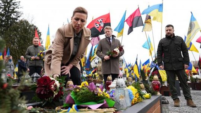 Ukrainian President Volodymyr Zelenskyy, Denmark's Prime Minister Mette Frederiksen, and her husband Bo Tengberg, center, lay wreaths during a memorial ceremony at the Field of Mars at Lychakiv Cemetery in Lviv, Ukraine, Friday Feb. 23, 2024. (Mads Claus Rasmussen/Ritzau Scanpix via AP) Ukrainian President Volodymyr Zelenskyy, Denmark's Prime Minister Mette Frederiksen, and her husband Bo Tengberg, center, lay wreaths during a memorial ceremony at the Field of Mars at Lychakiv Cemetery in Lviv, Ukraine, Friday Feb. 23, 2024. (Mads Claus Rasmussen/Ritzau Scanpix via AP)