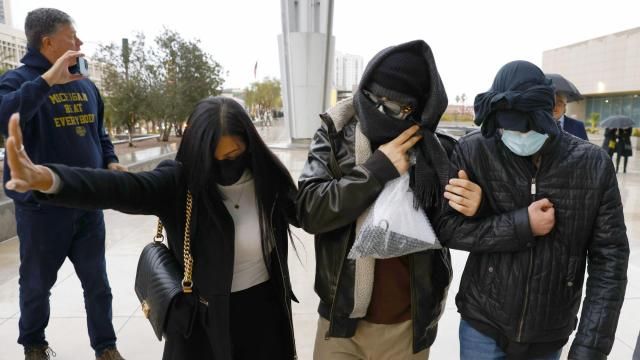 FILE - Alexander Smirnov, second from right, leaves the courthouse on Feb. 20, 2024, in Las Vegas. Smirnov, a former FBI informant charged with lying about a multimillion-dollar bribery scheme involving President Joe Biden’s family, will appear in a California federal court on Monday, Feb. 26, as a judge considers whether he must remain behind bars while he awaits trial. Special counsel David Weiss’ office is pressing Judge Otis Wright II to keep Smirnov in jail, arguing the man who claims to have ties to Russian intelligence is likely to flee the country. (Bizuayehu Tesfaye/Las Vegas Review-Journal via AP, File) FILE - Alexander Smirnov, second from right, leaves the courthouse on Feb. 20, 2024, in Las Vegas. Smirnov, a former FBI informant charged with lying about a multimillion-dollar bribery scheme involving President Joe Biden’s family, will appear in a California federal court on Monday, Feb. 26, as a judge considers whether he must remain behind bars while he awaits trial. Special counsel David Weiss’ office is pressing Judge Otis Wright II to keep Smirnov in jail, arguing the man who claims to have ties to Russian intelligence is likely to flee the country. (Bizuayehu Tesfaye/Las Vegas Review-Journal via AP, File)
