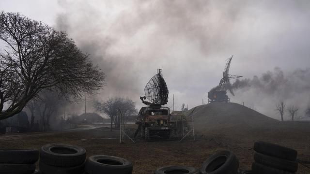 FILE - Smoke rise from an air defense base in the aftermath of an apparent Russian strike in Mariupol, Ukraine, on Feb. 24, 2022. Ukraine is marking Saturday, Feb. 24, 2024, two years since Russia’s full-scale invasion, with a string of foreign dignitaries and officials expected to visit the capital, Kyiv, in solidarity as Ukrainian forces run low on ammunition and weaponry and Western aid hangs in the balance. (AP Photo/Evgeniy Maloletka, File) FILE - Smoke rise from an air defense base in the aftermath of an apparent Russian strike in Mariupol, Ukraine, on Feb. 24, 2022. Ukraine is marking Saturday, Feb. 24, 2024, two years since Russia’s full-scale invasion, with a string of foreign dignitaries and officials expected to visit the capital, Kyiv, in solidarity as Ukrainian forces run low on ammunition and weaponry and Western aid hangs in the balance. (AP Photo/Evgeniy Maloletka, File)