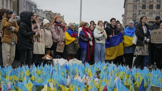 People stand at the memorial site for those killed during the war, near Maidan Square in central Kyiv, Ukraine, Saturday, Feb. 24, 2024. Ukraine is marking two years since Russia's full-scale invasion with a somber mood hanging over the country. On the battlefield, Ukrainian troops are running low on ammunition as they hope for further Western aid. (AP Photo/Efrem Lukatsky) People stand at the memorial site for those killed during the war, near Maidan Square in central Kyiv, Ukraine, Saturday, Feb. 24, 2024. Ukraine is marking two years since Russia's full-scale invasion with a somber mood hanging over the country. On the battlefield, Ukrainian troops are running low on ammunition as they hope for further Western aid. (AP Photo/Efrem Lukatsky)