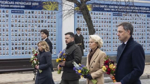 In this photo provided by the Ukrainian Presidential Press Office, Belgian Prime Minister Alexander De Croo, EU Commission President Ursula von der Leyen, Ukrainian President Volodymyr Zelenskyy, Italy's Premier Giorgia Meloni, Canadian Prime Minister Justin Trudeau, from right to left, attend laying flowers ceremony at the Wall of Remembrance to pay tribute to killed Ukrainian soldiers, in Kyiv, Ukraine, Saturday, Feb. 24, 2024. President Volodymyr Zelenskyy has welcomed Western leaders to Kyiv to mark the second anniversary of Russia's full-scale invasion, as Ukrainian forces run low on ammunition and foreign aid hangs in the balance. (Ukrainian Presidential Press Office via AP) In this photo provided by the Ukrainian Presidential Press Office, Belgian Prime Minister Alexander De Croo, EU Commission President Ursula von der Leyen, Ukrainian President Volodymyr Zelenskyy, Italy's Premier Giorgia Meloni, Canadian Prime Minister Justin Trudeau, from right to left, attend laying flowers ceremony at the Wall of Remembrance to pay tribute to killed Ukrainian soldiers, in Kyiv, Ukraine, Saturday, Feb. 24, 2024. President Volodymyr Zelenskyy has welcomed Western leaders to Kyiv to mark the second anniversary of Russia's full-scale invasion, as Ukrainian forces run low on ammunition and foreign aid hangs in the balance. (Ukrainian Presidential Press Office via AP)